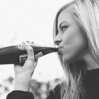 Woman drinking soft drink