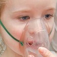 Child with breathing mask